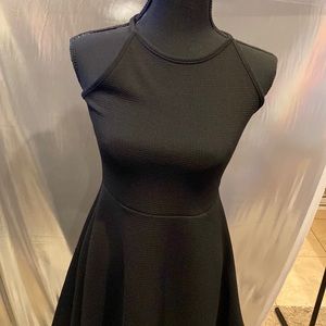 Nice fitted black flare dress!